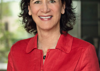 woman in red smiling