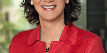 woman in red smiling