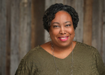 Black woman wearing green