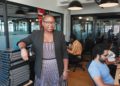 Black woman standing in a computer lab